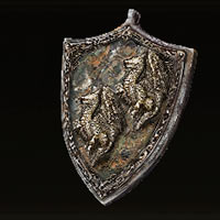 Talism&aacute;n de escudo con blas&oacute;n de drag&oacute;n +1