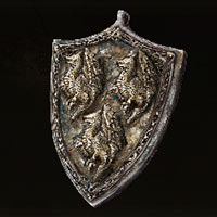 Talismán de escudo con blasón de dragón +2